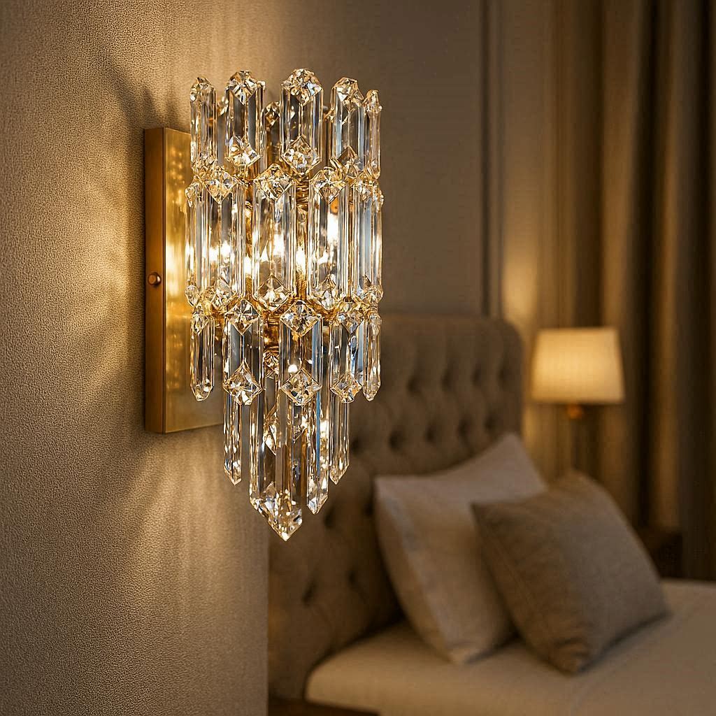 Crystal wall light fixture with gold base in luxury bedroom
